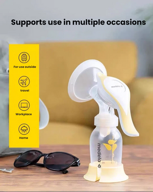 Medela Harmony Manual Breast Pump — pump assembled with bottle