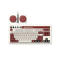 A person using the 8BitDo Retro 108 mechanical keyboard with a retro-style dual-button controller, tapping red action buttons labeled A and B. The keyboard features vintage white and maroon keycaps, placed on a wooden desk beside a colorful game screen — perfect for nostalgic gaming and creative typing.