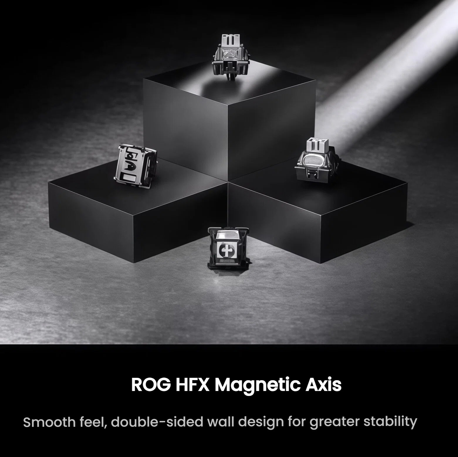 Close-up of ROG HFX Magnetic Axis switches displayed on minimalist black blocks. Features smooth tactile feedback, double-sided wall design, and enhanced stability for high-performance gaming and typing.