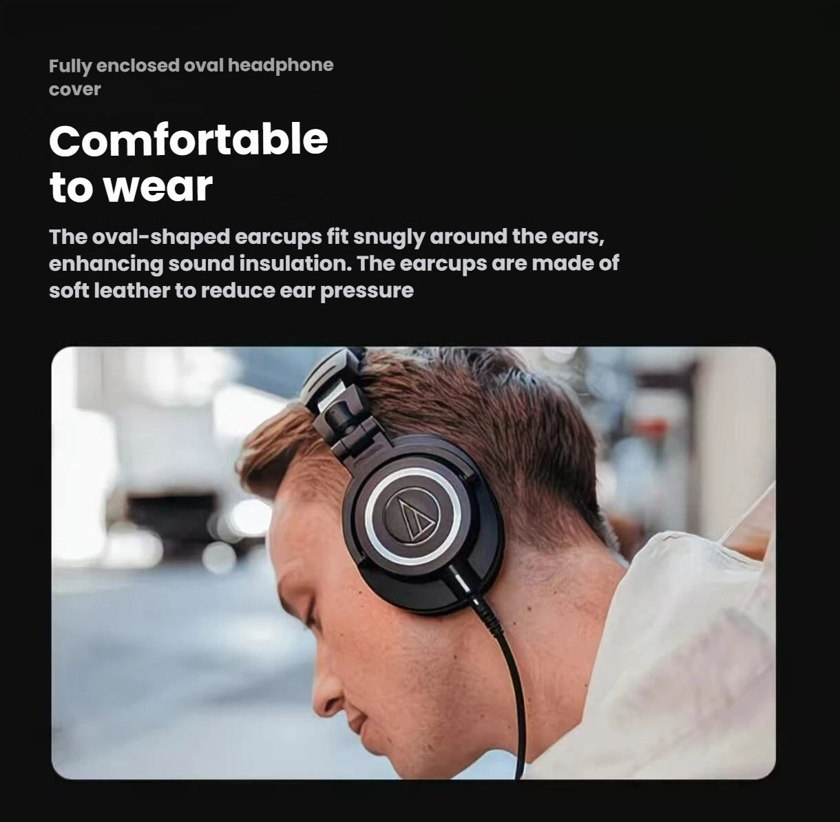 Man wearing Audio-Technica ATH-M50xENSO headphones — oval-shaped earcups made of soft leather provide snug fit and reduce ear pressure, ensuring comfortable long-term wear.