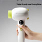 Parent placing Babycare cordless baby hair dryer onto wireless charging base, enabling quick recharging without cords for anytime use