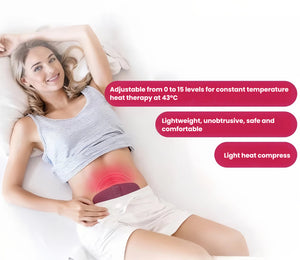 A woman lying comfortably on her back with the Beurer EM50 heat pad placed over her lower abdomen. The device delivers constant temperature heat therapy at 43°C with 15 adjustable intensity levels for personalized cramp relief.