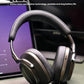 Bowers & Wilkins PX8 headphones resting on a desk next to a laptop — ideal for work, travel, or daily use with active noise cancellation and long battery life.