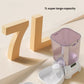 Cat Mate automatic pet feeder with 7-liter food hopper shown next to large "7L" text. Removable lid and base components highlight easy cleaning and maintenance.