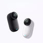 A close-up of the ultra-compact Insta360 GO 3S camera module, available in both matte black and arctic white finishes, highlighting its minimalist design.
