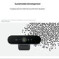 Top-down view of the BRIO 4K webcam surrounded by recycled plastic pellets, emphasizing its eco-friendly build using 38 % post-consumer recycled material.