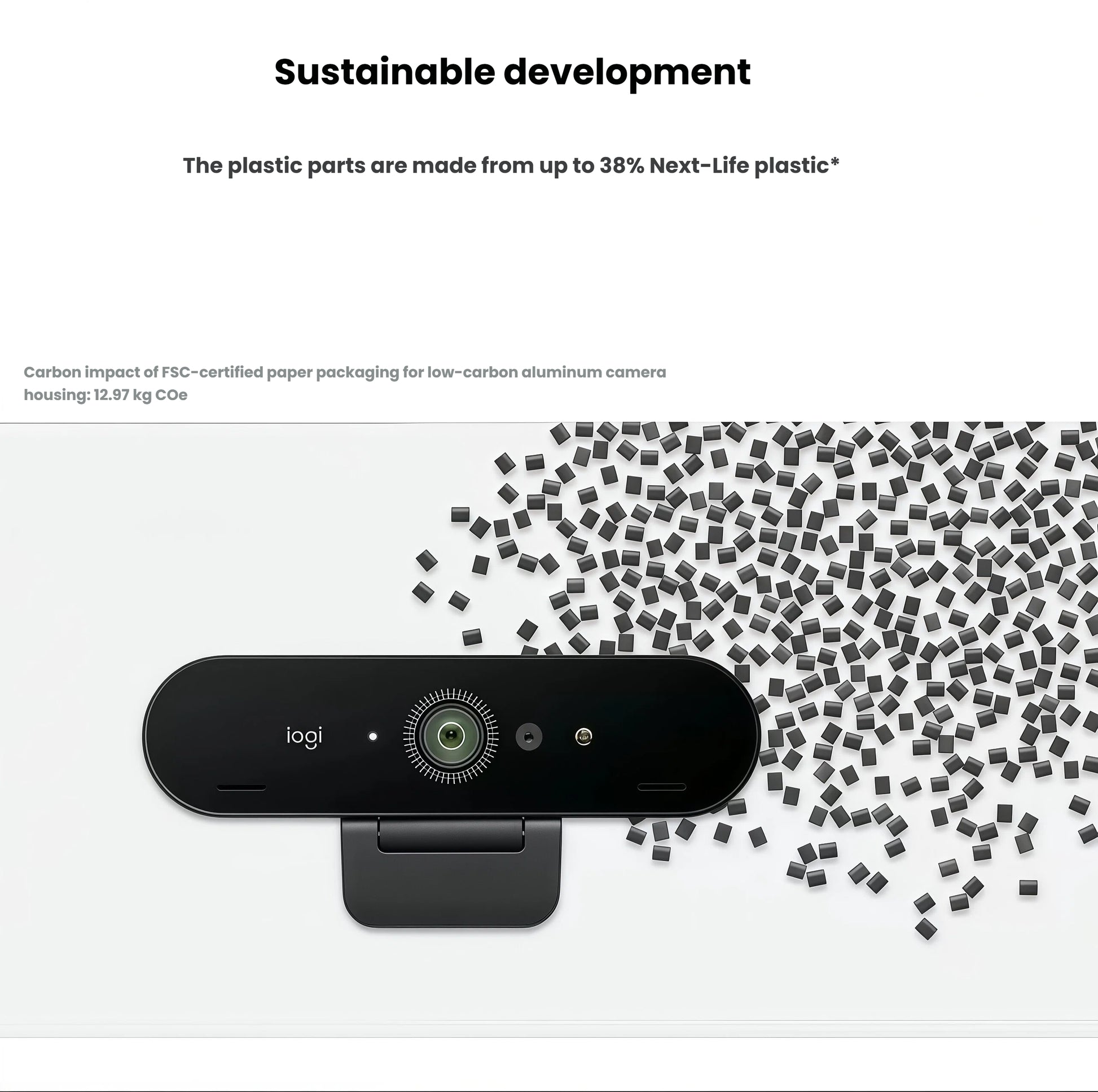 Top-down view of the BRIO 4K webcam surrounded by recycled plastic pellets, emphasizing its eco-friendly build using 38 % post-consumer recycled material.