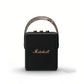 Front view of the Marshall Stockwell II portable wireless speaker in black with camouflage-pattern carry strap, highlighting its rugged, travel-ready style.