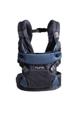 Studio shot of Nuna Cudl Clik Carrier in navy blue color—showing padded shoulder straps, magnetic chest buckle, and breathable mesh panels. Ideal for everyday babywearing from birth to toddler.