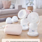 Philips Avent double electric breast pump on wooden table with automatic shutdown feature highlighted. Prevents nipple damage by turning off after 30 minutes of inactivity.