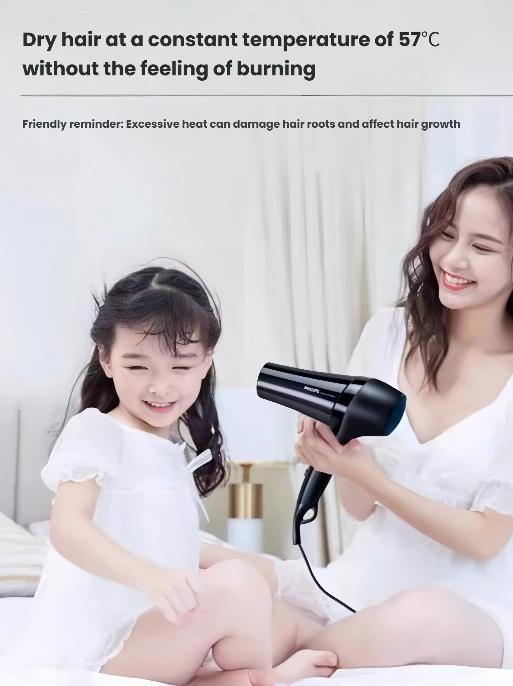 Mother drying her daughter’s hair with Philips DryCare Pro hairdryer at a safe, constant 57°C temperature—ideal for sensitive scalps and healthy hair care.