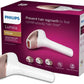 Image of a handheld IPL (Intense Pulsed Light) hair removal device in a sleek white and rose gold design. The device comes with three interchangeable attachment heads for different body areas, each designed with specialized treatment windows. The attachments are color-coded for easy identification and suited for face, body, and precision areas