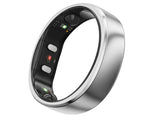 Close-up of the silver RingConn Gen 2 ring’s inner surface, revealing green and red optical sensors and titanium alloy shell.