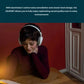 Woman studying with Sennheiser HD 450BT closed-back noise-canceling headphones in a quiet indoor environment
