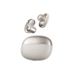 Shokz OpenDots One open-ear wireless earbuds in silver floating above the charging case — sleek design with secure ear clip and premium build for all-day comfort.