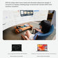 User working on floating 32:9 ultrawide screen via XREAL One AR glasses connected to Mac/Windows USB-C DP.