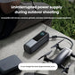 Anker power bank charging a drone outdoors on a table, demonstrating portable power for cameras and gimbals