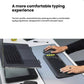 Close-up of hands typing on a graphite Logitech POP Icon Keys keyboard, illustrating the comfortable, smooth, and quiet typing experience of the low-profile keys.