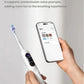 A user holding the usmile Y20 PRO toothbrush while using the companion smartphone app to set up personalized and customizable voice prompts for guided brushing.